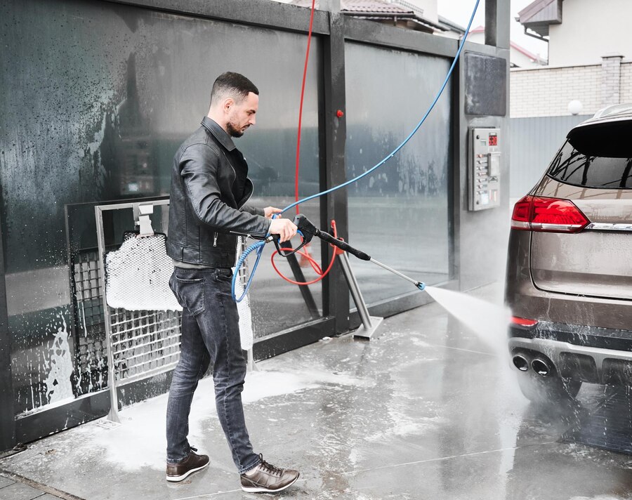 young man washing car carwash station outdoor 651396 2388